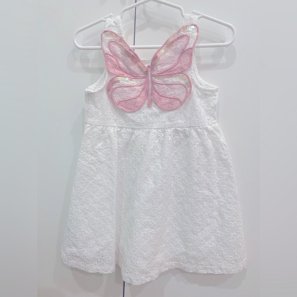 Spring dress for toddler with butterfly back detail